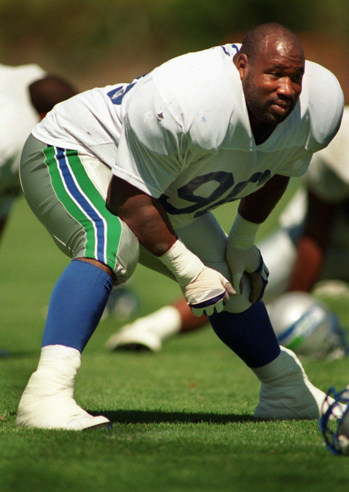 Cortez Kennedy stretches during morning workout at the Seahawks training facility in Kirkland. (Photo Archive / SR)