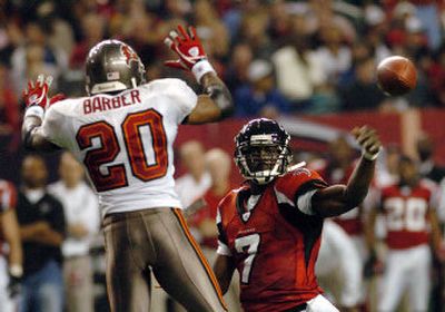 
Falcons quarterback Michael Vick is excited to be playing on Thanksgiving Day.
 (Associated Press / The Spokesman-Review)