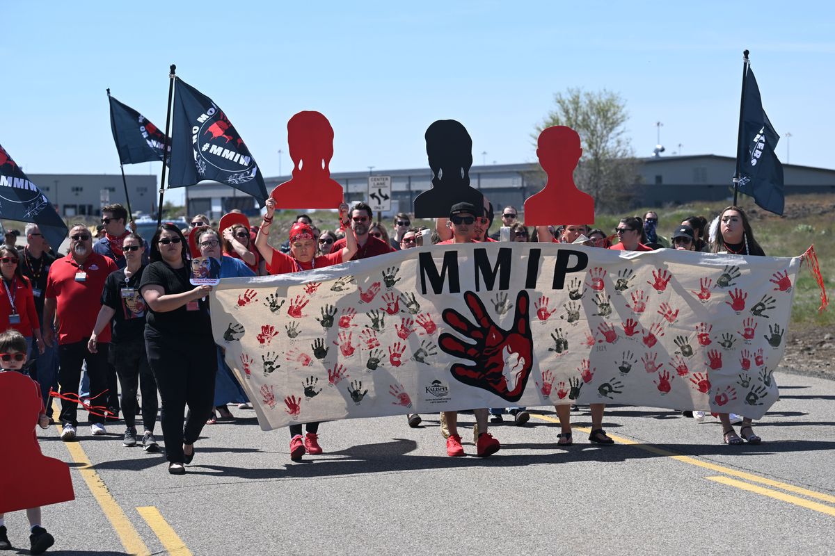 Concerned citizens, many who are Native American, gather and carry signs around Northern Quest Resort and Casino in Airway Heights on Friday to draw attention the missing and killed Indigenous people.  (Jesse Tinsley/THE SPOKESMAN-REVIEW)