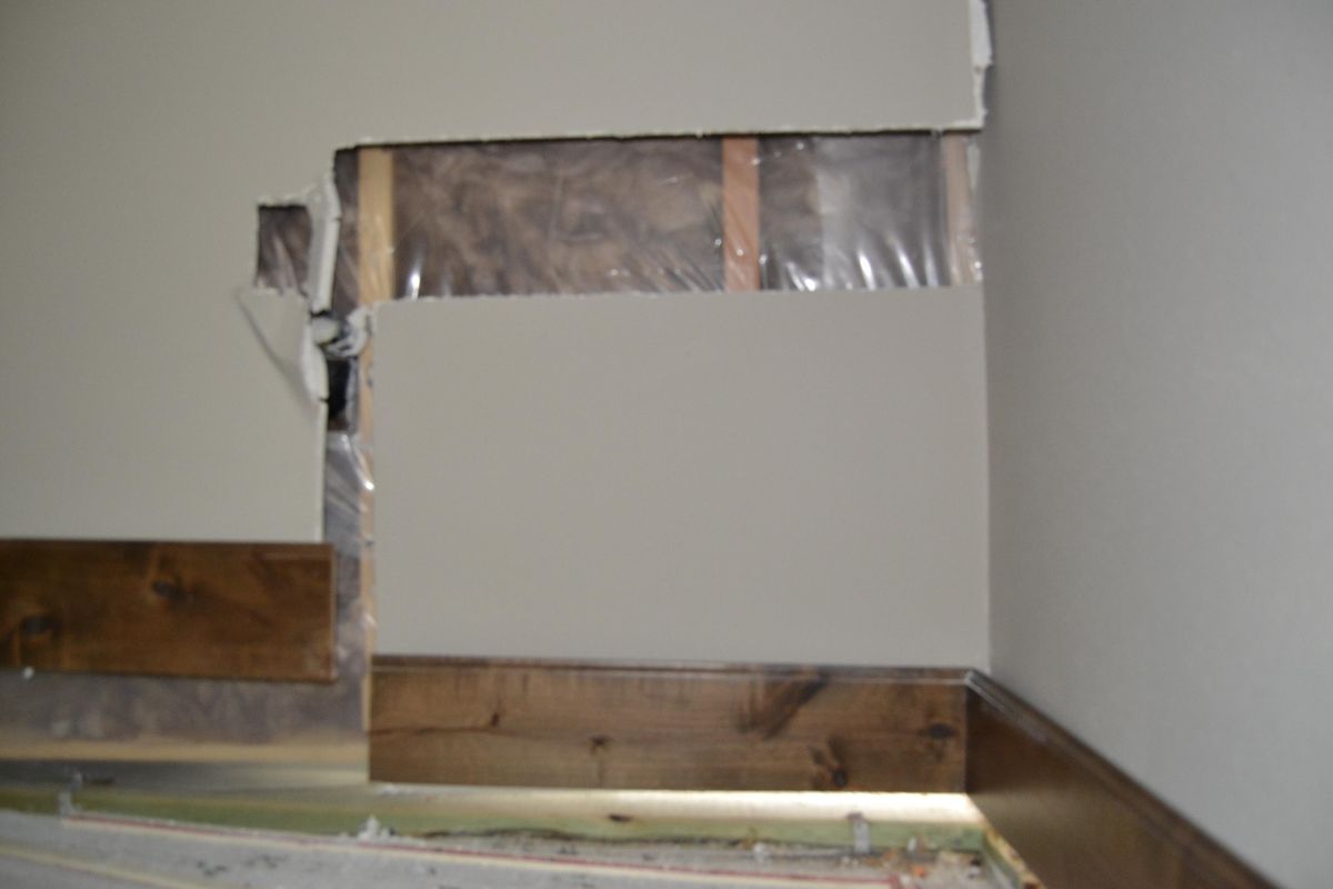 Interior damage to a home at 13811 Wandermere Estates Lane, which was torn down in October. Earth movement caused the foundation to settle, tearing apart the walls and floorboards. (Courtesy of Rick Wetmore)