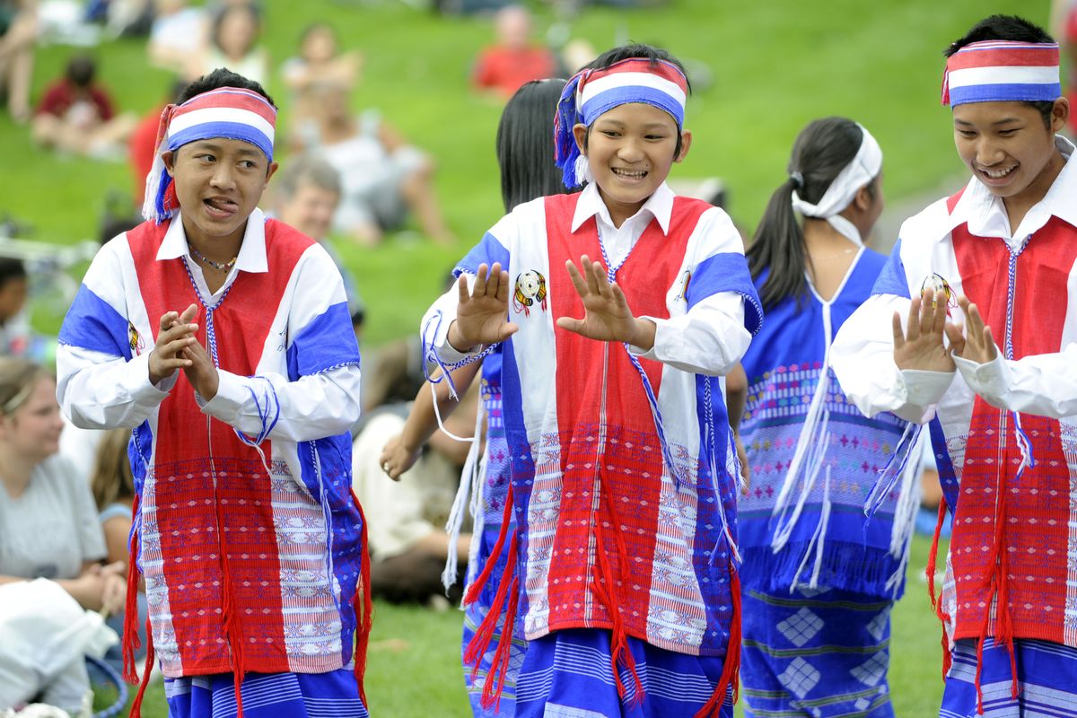 Young Karen dancers perform for the crowds at Unity in the Community in Riverfront Park Saturday, Aug. 21, 2010.  Karen people are a minority from Burma. (Jesse Tinsley / The Spokesman-Review)