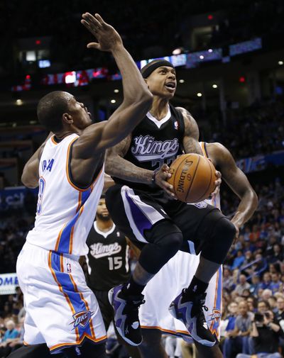 Former Washington Husky Isaiah Thomas scored a career-high 38 points in the Kings’ 108-93 loss to the Thunder. (Associated Press)