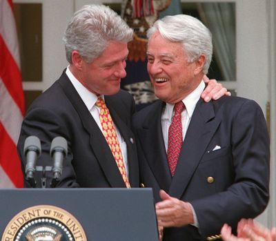 In this June 19, 1996, photo, President Clinton embraces R. Sargent Shriver in the Rose Garden of the White House.  (Associated Press)