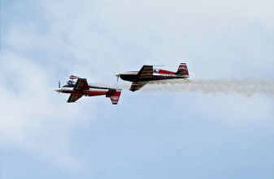 Team OK3 Air concludes aerobatic action by vintage and modern aircraft during Thunder Over the Prairie, an air show at the Coeur d'Alene Airport in Hayden last month. The show's finances have been called into question.
(File/ / The Spokesman-Review)