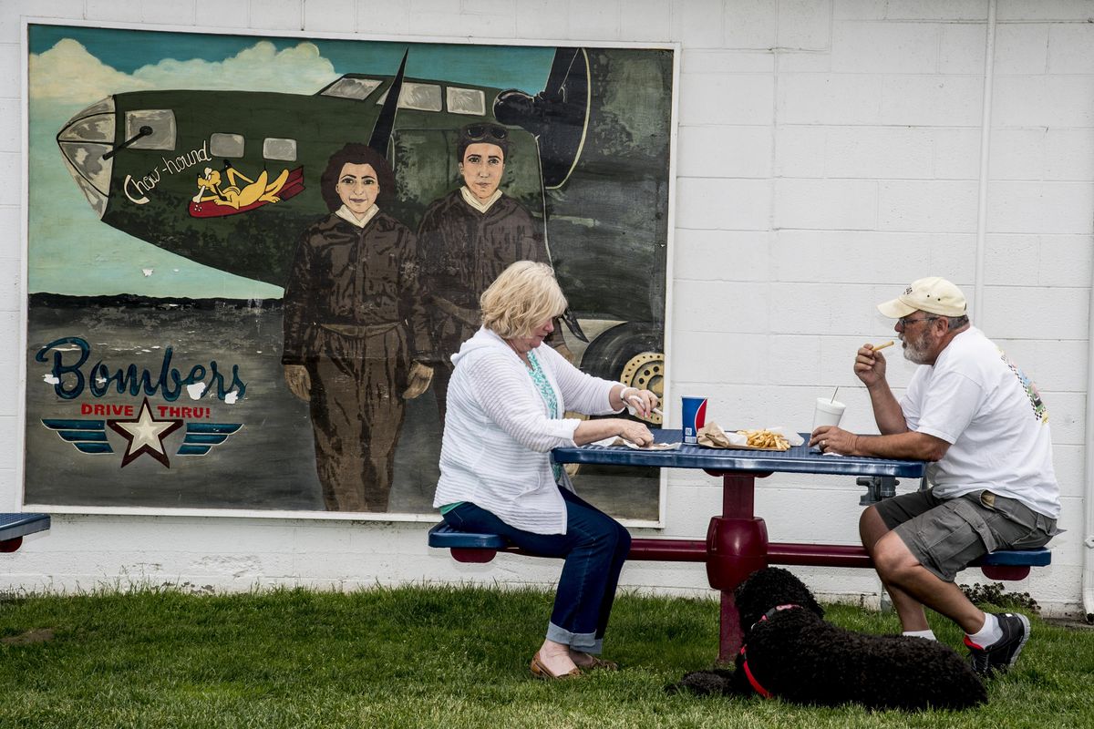 Marilou DeWoody and her husband Curt eat lunch at the Bomber