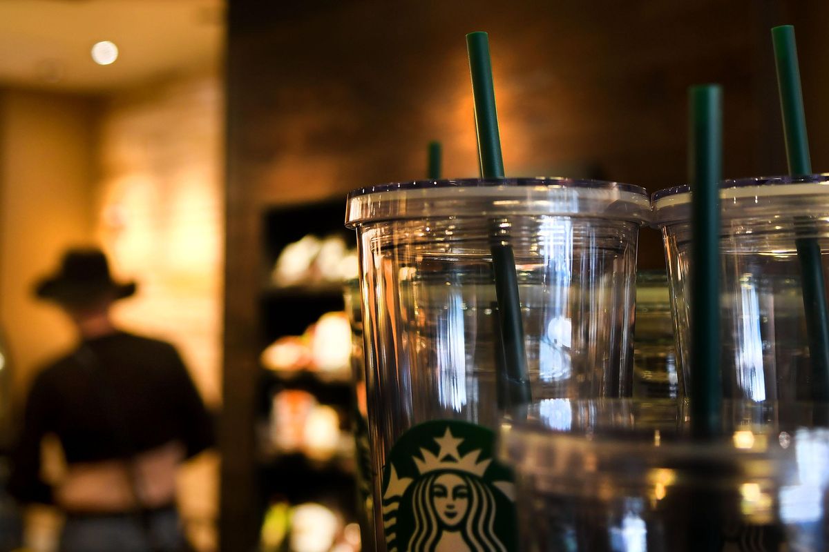 A display of Starbucks’ reusable cups and straws is on display at  a Starbucks’ location in Spokane on Monday, July 9, 2018. (Kathy Plonka / The Spokesman-Review)