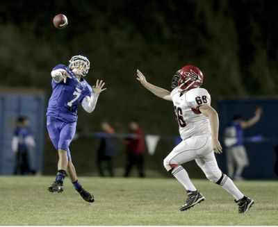 Pullman quarterback Mason Petrino is moving eight miles down the road to toss footballs for his father, Idaho coach Paul Petrino. (Courtesy of Geoff Crimmons / Moscow-Pullman Daily News)