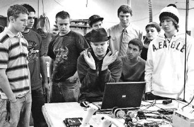 
West Valley senior Tom Mott explains to members of a manufacturing technology class the concept of a robot that he and others in the program are building for a  competition.  The class is part of the Bill and Melinda Gates Foundation small-school initiative. 
 (J. BART RAYNIAK / The Spokesman-Review)