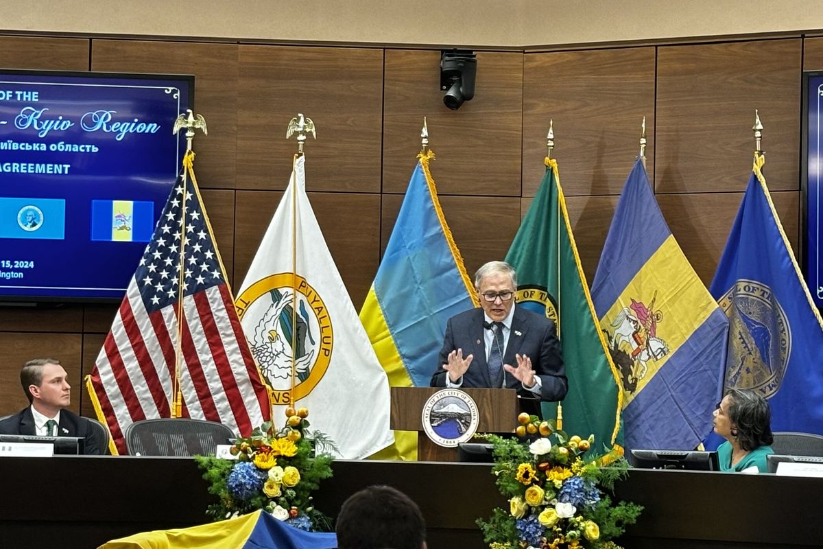 Gov. Jay Inslee speaks to the crowd Friday during the ceremonial Sister State Agreement with the Kyiv Region in Ukraine.  (Lauren Rendahl/The Spokesman-Review)