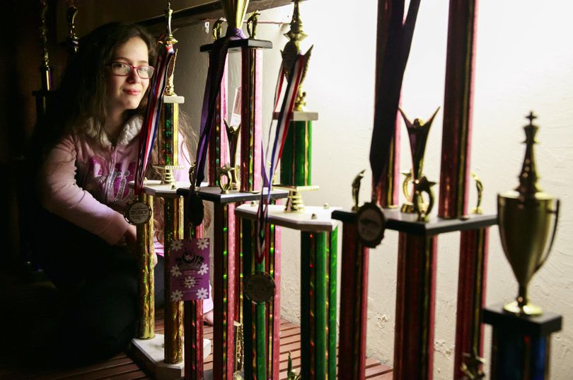 Naomi Bashkansky already had a lot of chess trophies and recently claimed the 2016 World School Chess Championship for girls under 13. The Bellevue eighth-grader spends hours working on strategy. (Erika Schultz / Erika Schultz Seattle Times)