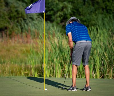 Brad Marek sinks his final putt during the last hole of the Lilac City Invitational golf tournament at The Fairways Golf Course on Sunday Aug. 2, 2020.  (Libby Kamrowski/ THE SPOKESMAN-REVIEW)