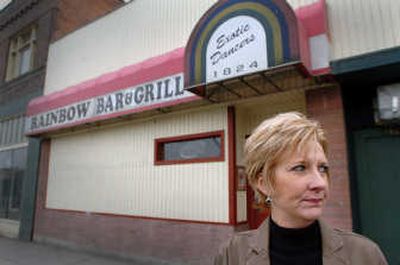 
Linda Davies stands in front of the Rainbow Bar, a strip club on East Sprague on Wednesday. Davies and other volunteers will host the annual Easter service at the bar on Sunday. THE SPOKESMAN-REVIEW
 (JESSE TINSLEY THE SPOKESMAN-REVIEW / The Spokesman-Review)