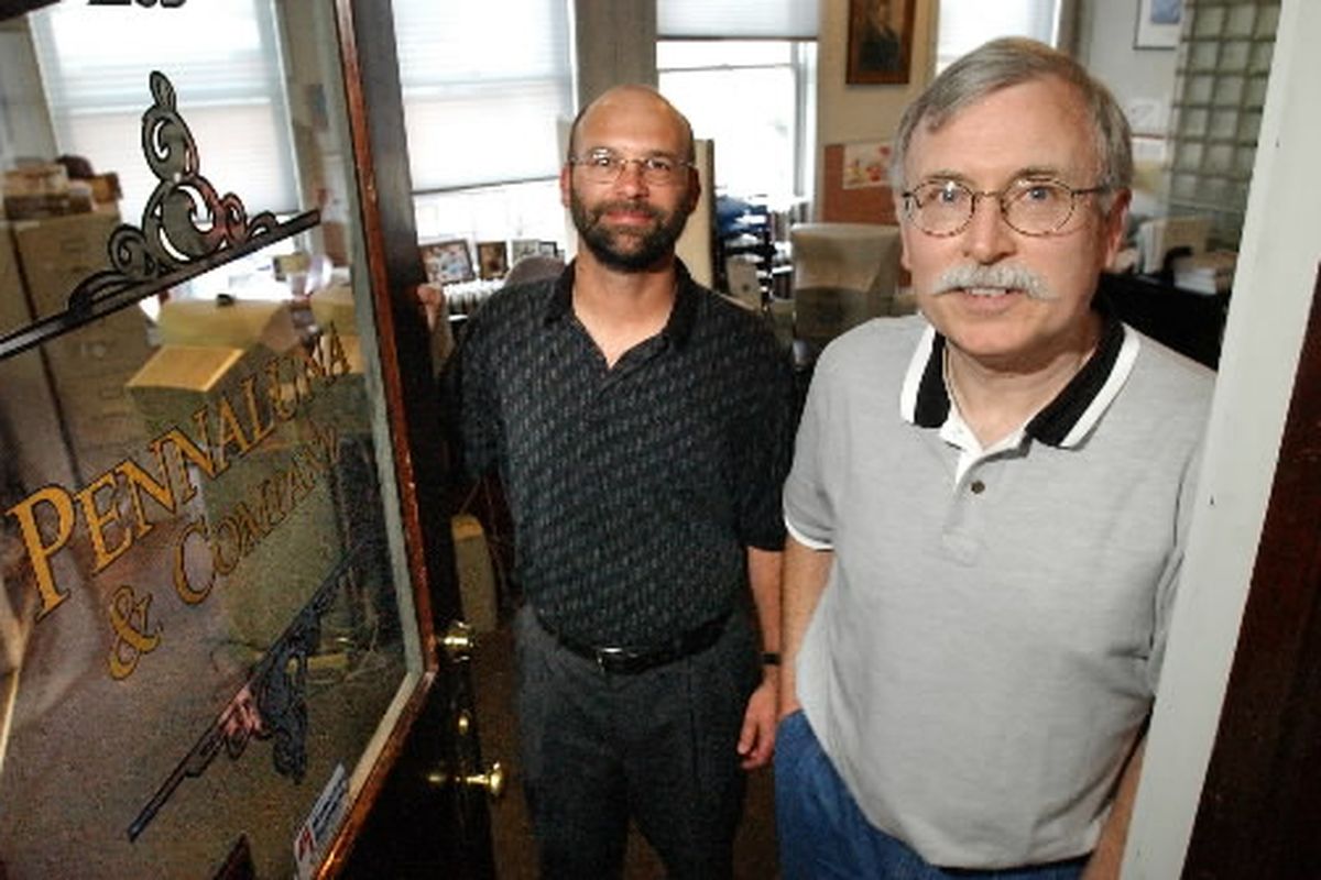 This 2003 SR file photo by Jesse Tinsley shows Tom Wobker, right, about a year after I began posting his poems in Huckleberries and my old Hot Potatoes column.  At the time, Tom and Ron Nicklas, left, were running Pennaluna and Co, a small independent stock brokerage firm in Coeur d