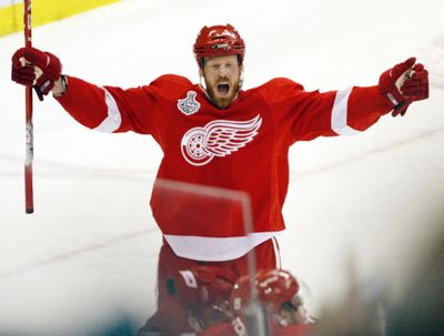 Detroit’s Johan Franzen celebrates one of four Red Wings goals in the second period Saturday. (Associated Press / The Spokesman-Review)
