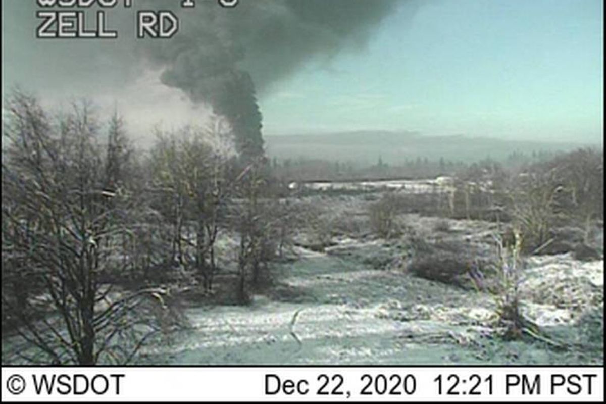 A Washington state Department of Transportation traffic camera captures an image of a train that derailed north of Seattle, close to the Canadian border on Tuesday, Dec. 22, 2020. Authorities say it was carrying crude oil.  (HOGP)