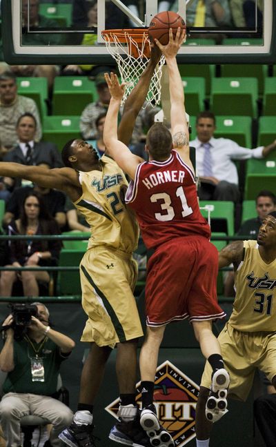 Dennis Horner’s basket helped North Carolina State beat USF. (Associated Press)