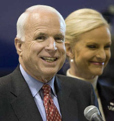 
Sen. John McCain, with his wife, Cindy, at his side, speaks to reporters  in Phoenix on Feb. 5. Associated Press
 (Associated Press / The Spokesman-Review)