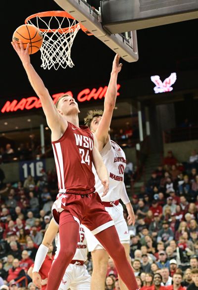Washington State guard Justin Powell (24) drives to the hoop during a nonconference game against Eastern Washington on Nov. 21 at the Spokane Arena. Powell has agreed to join the Miami Heat's Summer League team.  (Tyler Tjomsland/The Spokesman-Review)