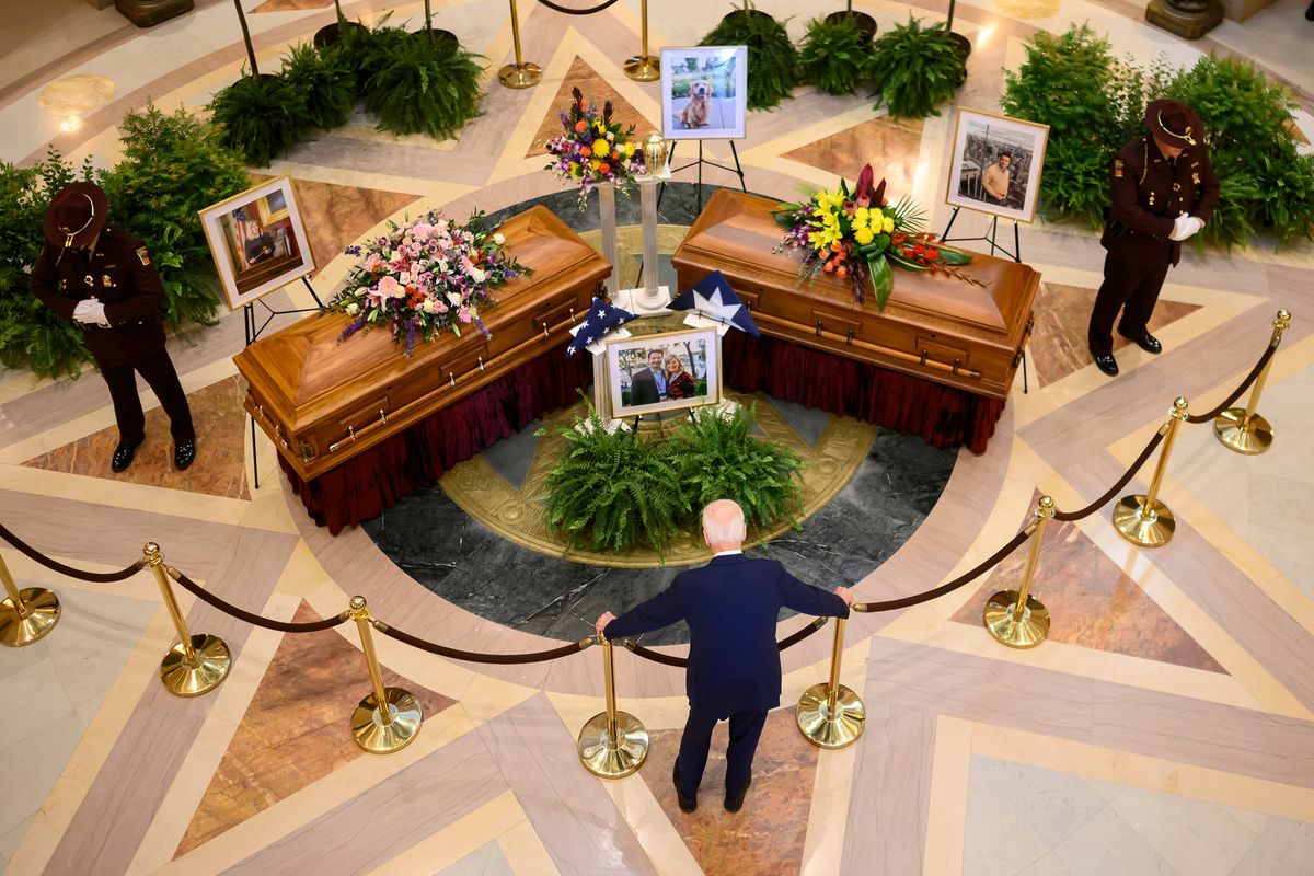Former U.S. President Joe Biden pays his respects in the Minnesota Capitol Rotunda for Speaker Emerita Melissa Hortman, her husband Mark and their golden retriever Gilbert as they laid in state on Friday at the State Capitol in St. Paul, Minn.  (Aaron Lavinsky/Star Tribune)
