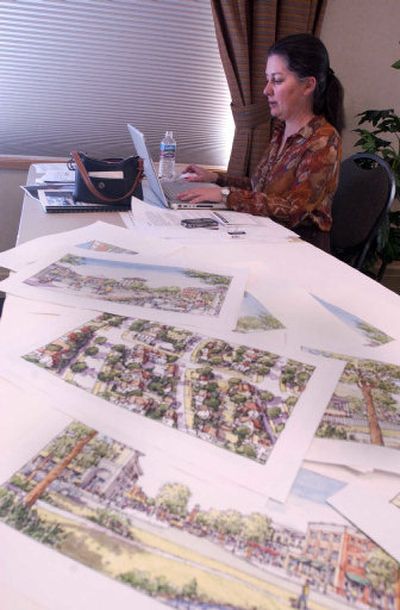 
Susan Henderson, the design director for PlaceMakers in Albuquerque, N.M., was part of a team assisting Post Falls in coming up with proposed solutions to their City Center project and being smarter about growth patterns. The team held a public meeting Monday  and shared some of its findings. 
 (J. Bart Rayniak / The Spokesman-Review)