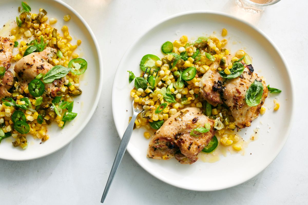 Marinate your chicken thighs in pickled jalapeño brine, then toss the peppers with fresh summer corn and lime for a dinner that’s spicy, sweet, salty and sour.  (David Malosh)