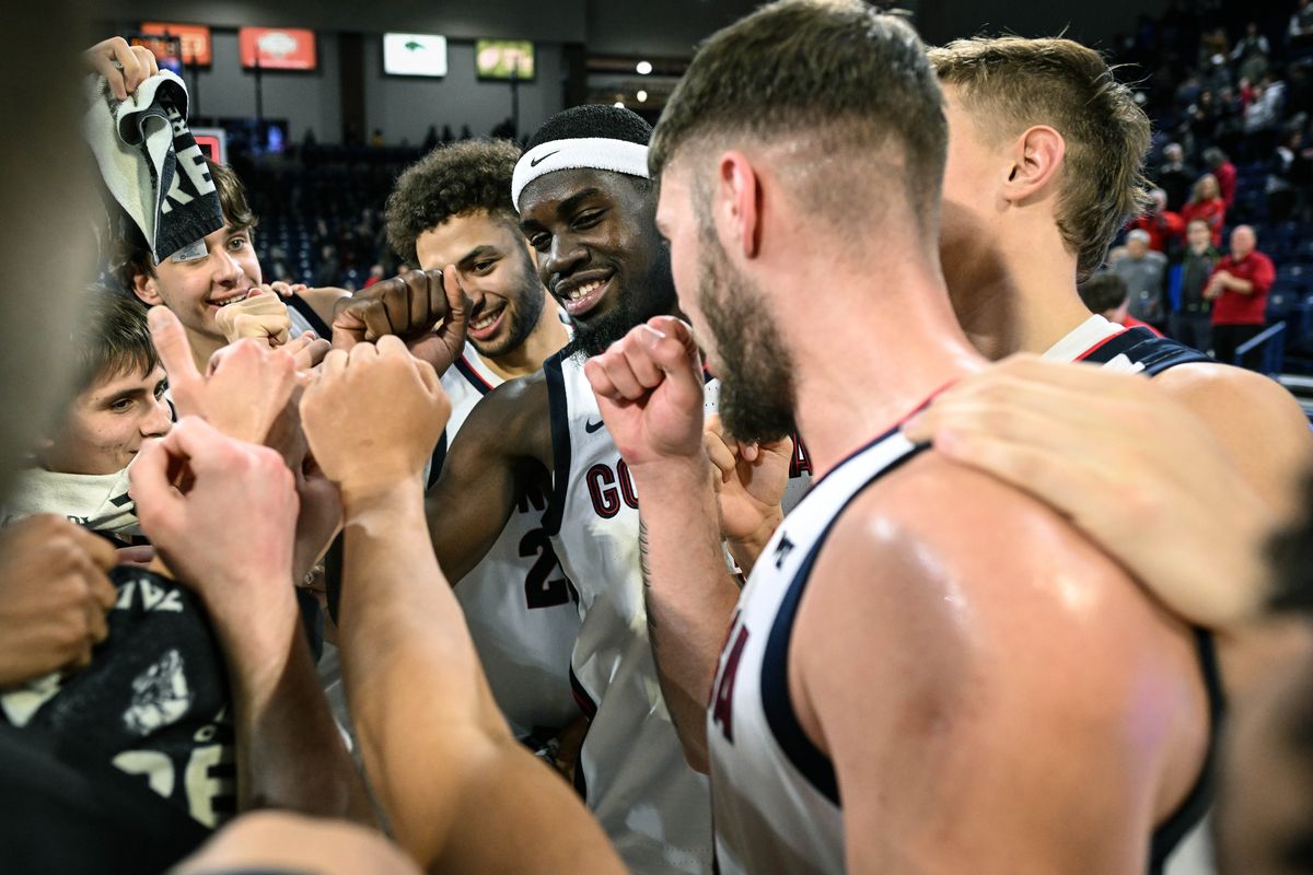 The Zags circle up after their 123-57 drubbing of Eastern Oregon during a NCAA college basketball game, Tuesday, Nov. 14, 2023, in the McCarthey Athletic Center.  (COLIN MULVANY/THE SPOKESMAN-REVIEW)