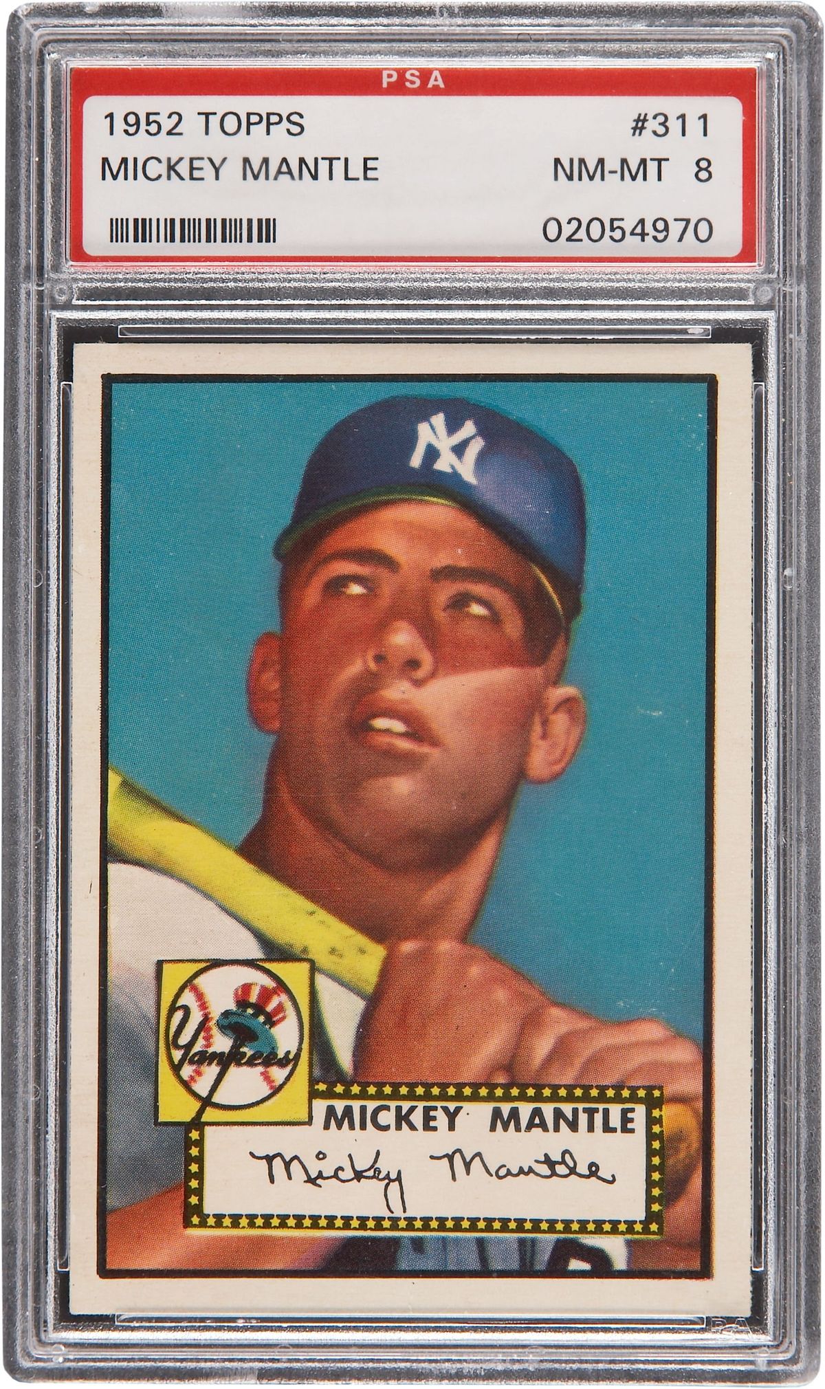 This is a higher-grade 1952 Topps Mickey Mantle rookie card. Associated Press photos (Associated Press photos)