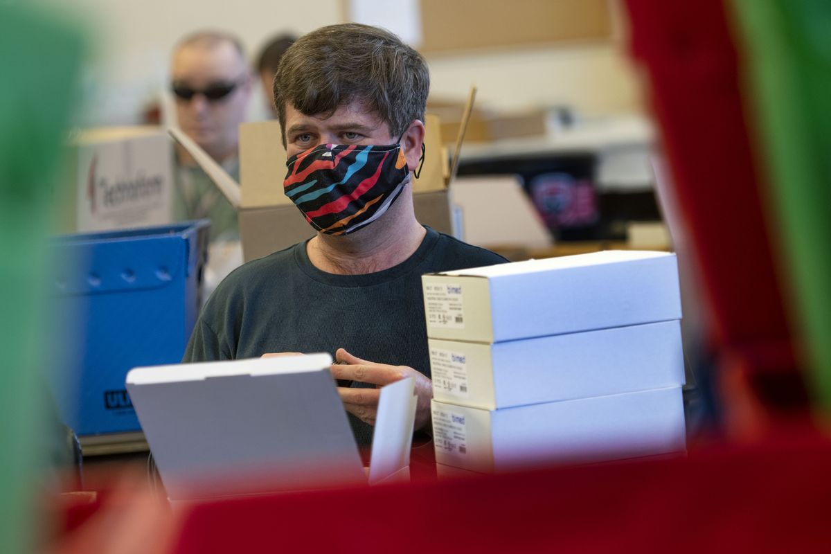 Chris Bowen, 37, works at Tesh Vocational Center, a local nonprofit that helps people with disabilities gain employment and independent living in Coeur d’Alene on Thursday, March 4, 2021. The folks at Tesh are concerned that a hike in minimum wage will negativley affect their ability to seek employment for developmentally disabled adults who work part-time.  (Kathy Plonka/The Spokesman-Review)