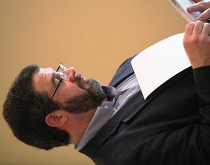 Kootenai County sheriff's candidate John Green looks over his notes at a recent meeting of the Panhandle Pachyderm Club in Post Falls (Duane Rasmussen/file photo)