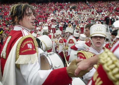 
Rocker Tommy Lee, left, joined the University of Nebraska marching band last year. 
 (Associated Press / The Spokesman-Review)