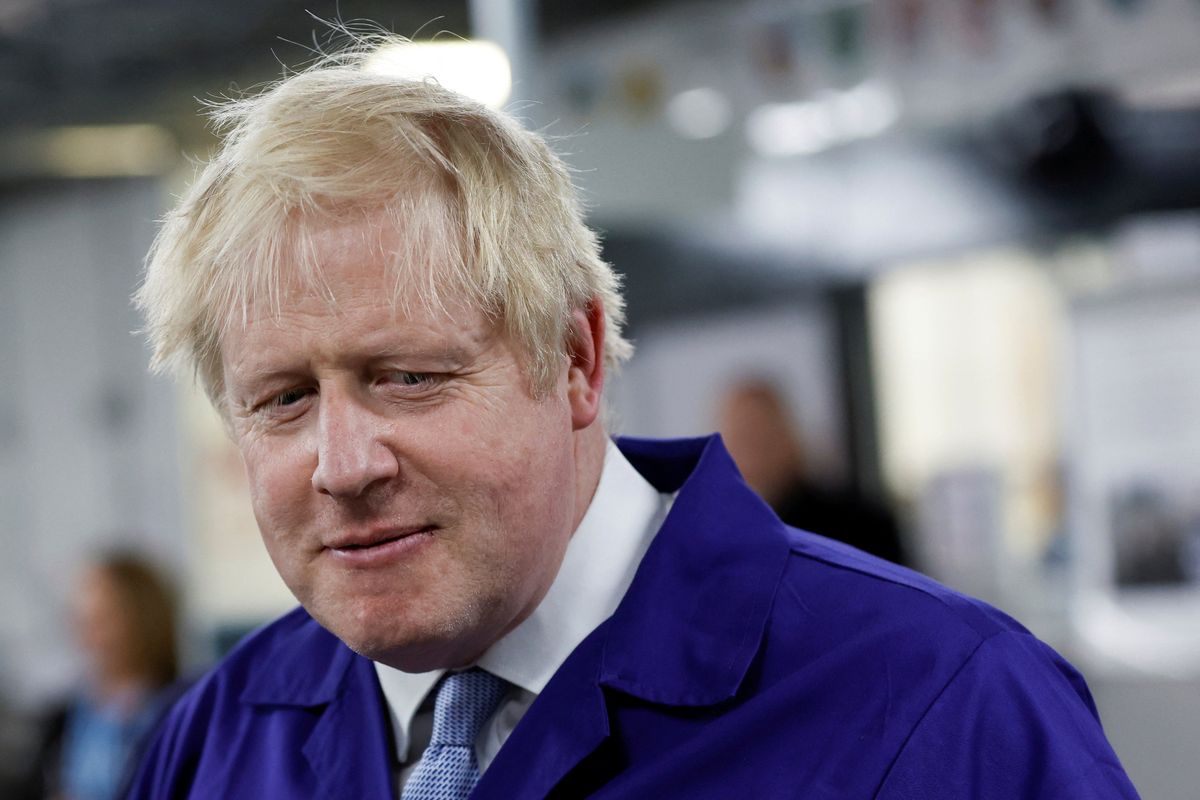 British Prime Minister Boris Johnson visits the technology centre at Hopwood Hall College, in Middleton, Greater Manchester, England, Thursday Feb. 3, 2022. (Jason Cairnduff)