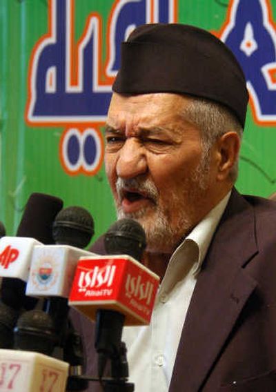 
Adnan al-Dulaimi,  leader of the Iraq Accordance Front, the largest Sunni bloc in parliament, speaks to reporters ion August. Associated Press
 (Associated Press / The Spokesman-Review)