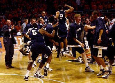 
Penn State celebrates after officials wave off Illinois' final basket.
 (Associated Press / The Spokesman-Review)