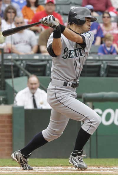 Ichiro Suzuki singles off Texas’ Scott Feldman to open the game. (Associated Press)