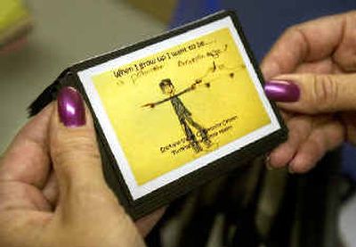 A seven-year-old artist expressed his wish to grow up to be a policeman on a name plate for an upcoming Valley Center fund-raiser.
(Holly Pickett photos/ / The Spokesman-Review)