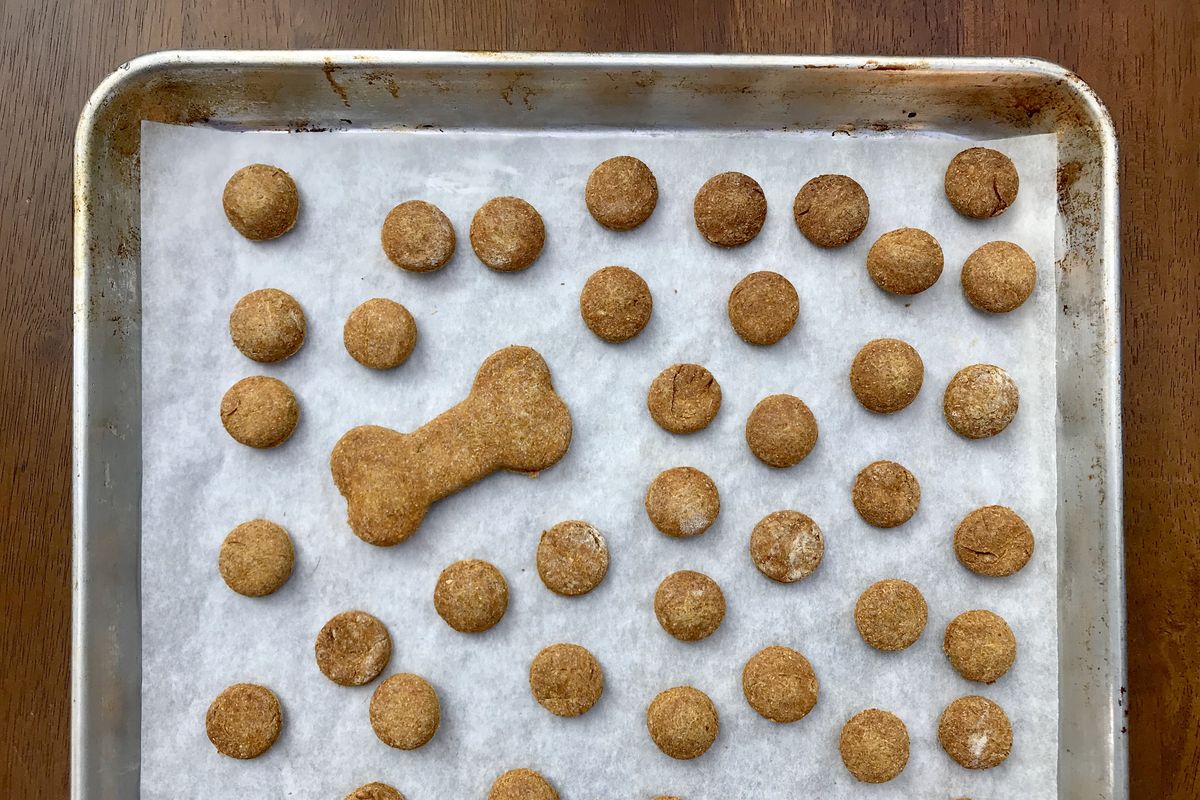 Dog treats are simple to make at home. This recipe features pumpkin and peanut butter. (Kimberly Lusk/The Spokesman-Review)