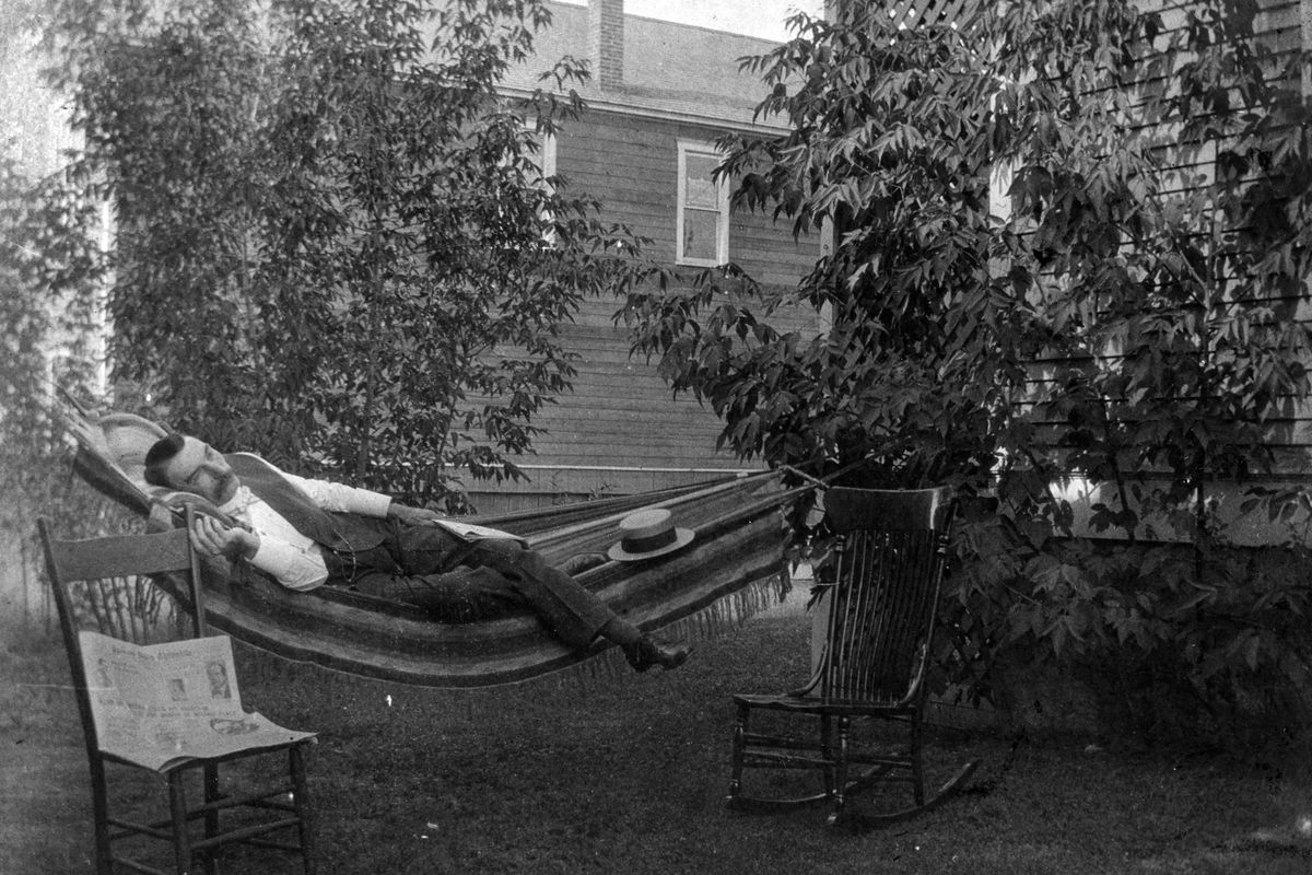 Francis N. LaVell takes a breather in the backyard of his home at 1008 W. Sinto Ave., in Spokane in 1908. His real estate and insurance office was just around the corner at 1405 N. Monroe St.