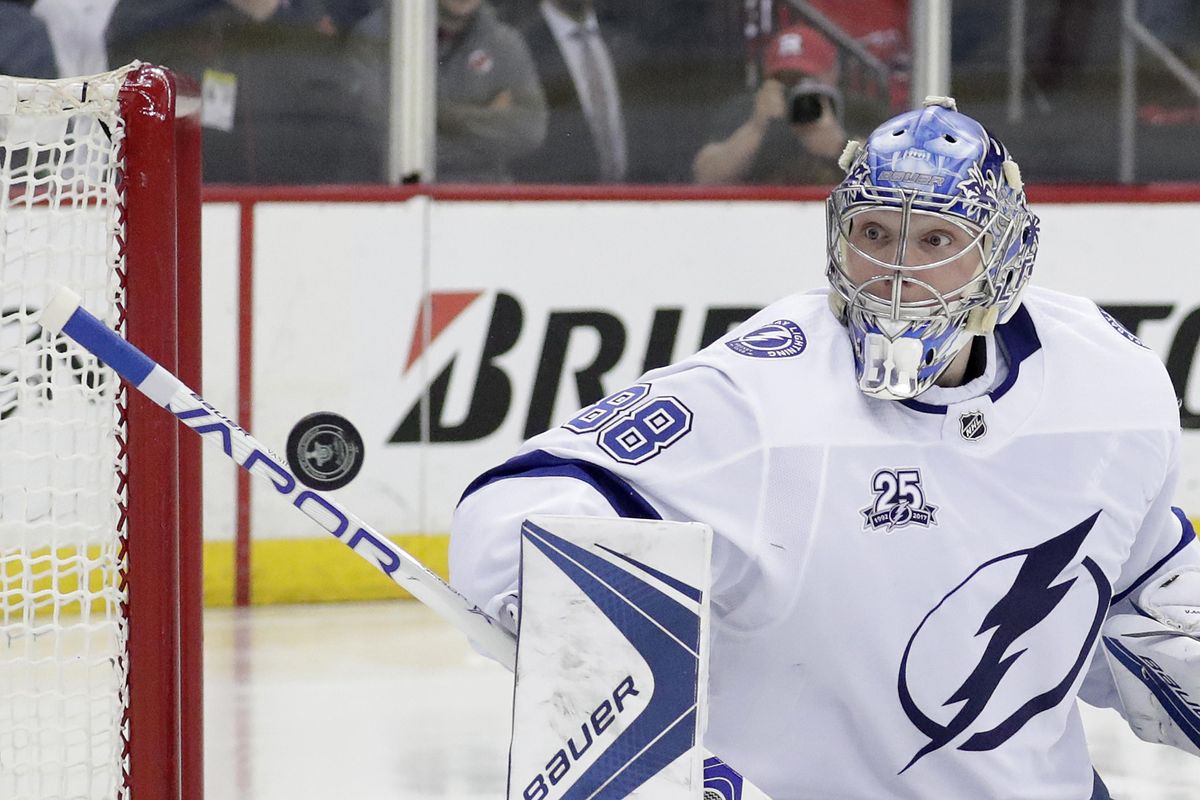 Tampa Bay Lightning goaltender Andrei Vasilevskiy, of Russia, makes a save against the New Jersey Devils during the second period of Game 4 of an NHL first-round hockey playoff series, Wednesday, April 18, 2018, in Newark, N.J. (Julio Cortez / Associated Press)