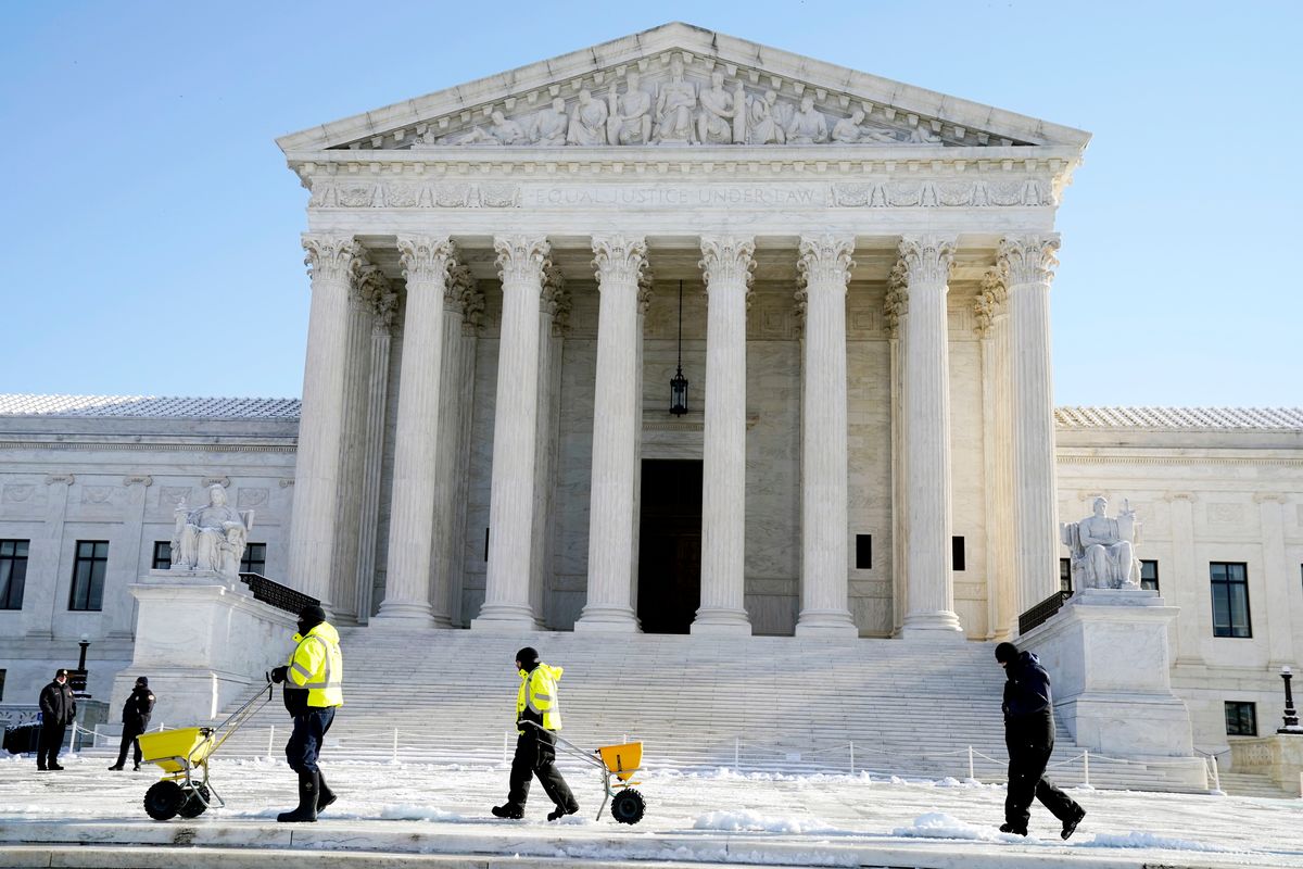FILE - The Supreme Court shown Friday, Jan. 7, 2022, in Washington. The Supreme Court has stopped the Biden administration from enforcing a requirement that employees at large businesses be vaccinated against COVID-19 or undergo weekly testing and wear a mask on the job. The court