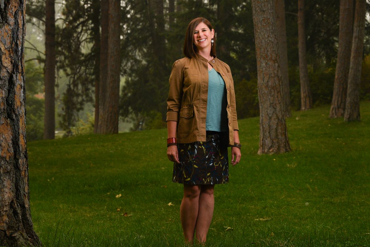 Woman of the Year honoree Poppy White, at Manito Park in Spokane, keeps camping inclusive as director of camping and program services at Camp Fire Inland Northwest.  (Tyler Tjomsland/THE SPOKESMAN-REVIEW)