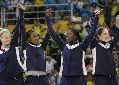 
Emily Fox, Candice Wiggins, Mattee Ajavon and Melanie Thomas, left to right, allowed the U.S. team to claim gold. Associated Press
 (Associated Press / The Spokesman-Review)