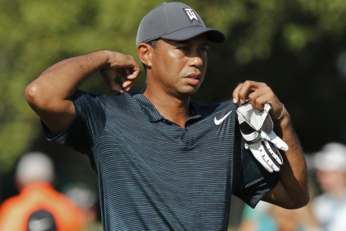 Tiger Woods walks off 12the tee during the first round of the PGA Championship golf tournament at Bellerive Country Club, Thursday, Aug. 9, 2018, in St. Louis. (Jeff Roberson / AP)