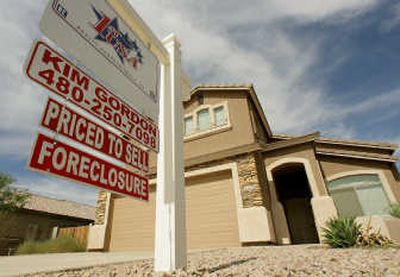 
A  sign indicates a foreclosure in Queen Creek, Ariz., Sept. 26. Associated Press
 (Associated Press / The Spokesman-Review)