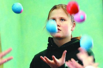 
Maya Goldblum, a fifth-grader at the Waldorf School in Sandpoint, participated in group juggling after a demonstration at the school. 
 (Kathy Plonka / The Spokesman-Review)
