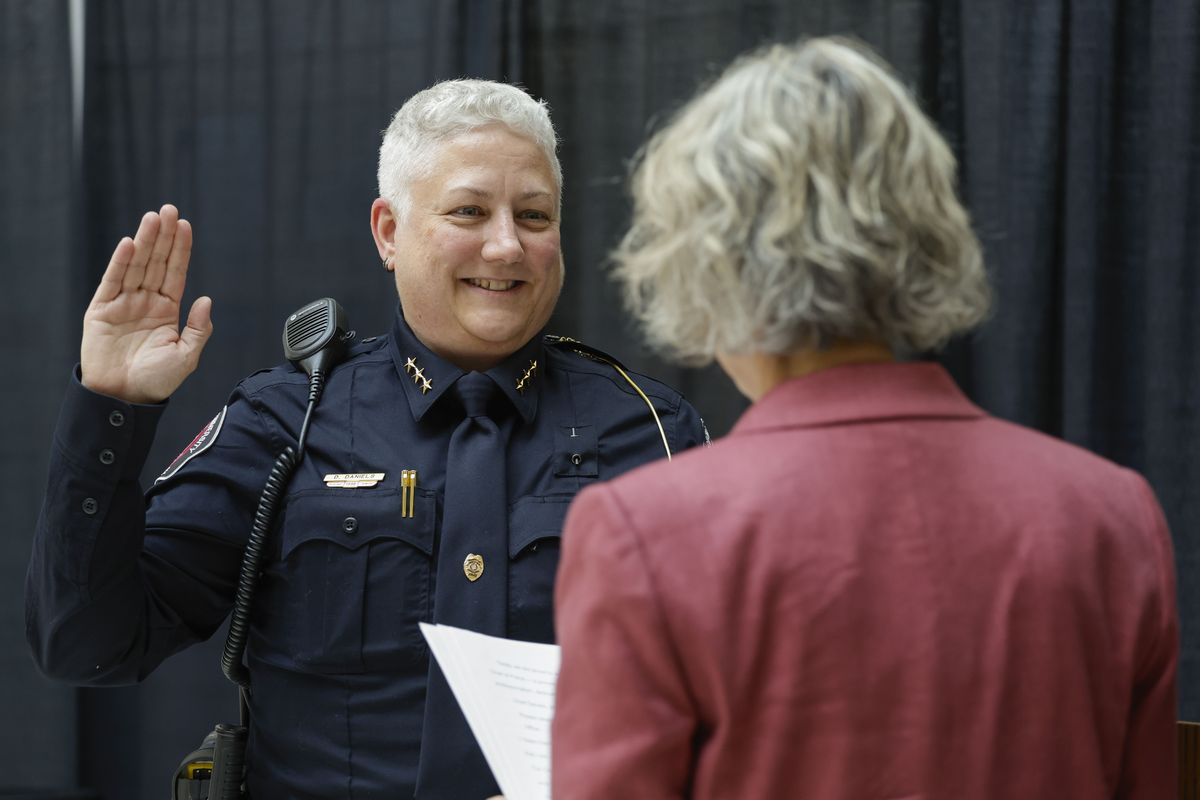 Washington State University’s new police chief, Dawn Daniels, is sworn in by WSU President Elizabeth Cantwell during a ceremony on Friday, Aug. 15, 2025, at the Holland and Terrell Libraries Atrium in Pullman, Wash.  (Geoff Crimmins/For The Spokesman-Review)