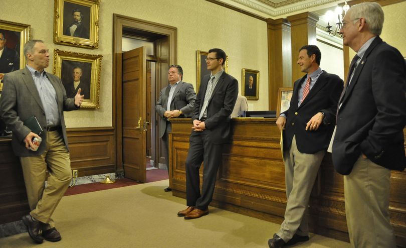 OLYMPIA -- Legislative leaders gather outside the governor's conference room before a meeting to start budget discussions for the upcoming special session. From left House Appropriations Chairman Ross Hunter, Office of Financial Management Director David Schumacher, Senate Majority Floor Leader Joe Fain, Senate Ways and Means Committee Chairman Andy Hill and House Appropriations Ranking Republican Bruce Chandler. (Jim Camden/Spokesman-Review)