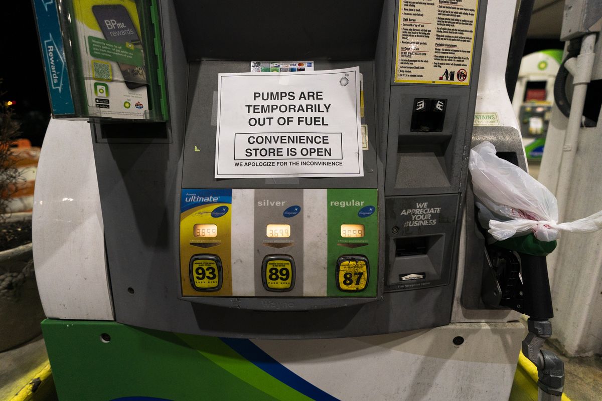 A gas pump at a gas station in Silver Spring, Md., is out of service, notifying customers they are out of fuel, late Thursday, May 13, 2021. Motorists found gas pumps shrouded in plastic bags at tapped-out service stations across more than a dozen U.S. states Thursday while the operator of the nation