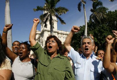 
Workers attend a political gathering in support of ailing Cuban President Fidel Castro in Havana, Cuba, on Tuesday. 
 (Associated Press / The Spokesman-Review)