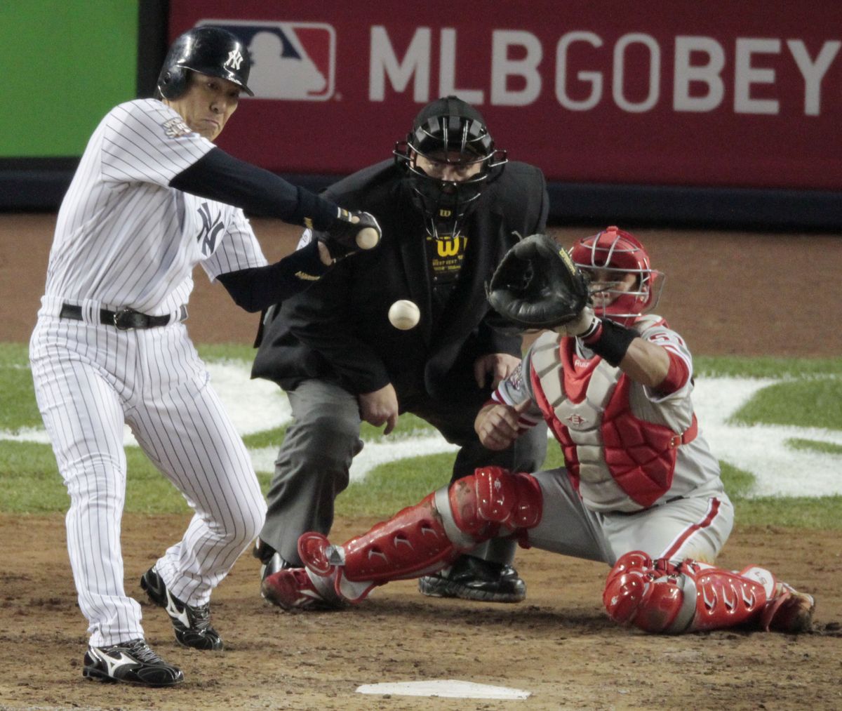 Series MVP Hideki Matsui connects for a two-run double in the fifth inning.   (Associated Press / The Spokesman-Review)