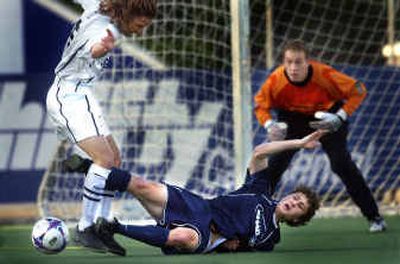 Spokane's Ben Sawyer hits the turf to prevent Sacramento's Levi Henson from scoring during United States Open Cup play on Wednesday night at Joe Albi Stadium. Spokane's Ben Sawyer hits the turf to prevent Sacramento's Levi Henson from scoring during United States Open Cup play on Wednesday night at Joe Albi Stadium.
(Jed Conklin/Jed Conklin/ / The Spokesman-Review)